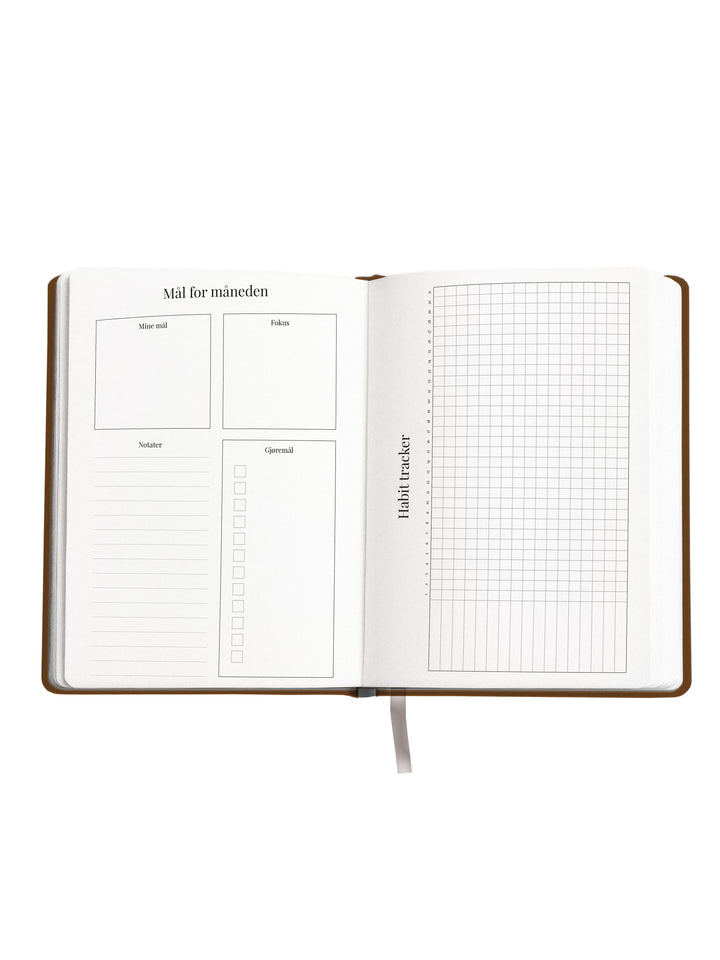 Mål for måneden og habit tracker i kalender/almanakk