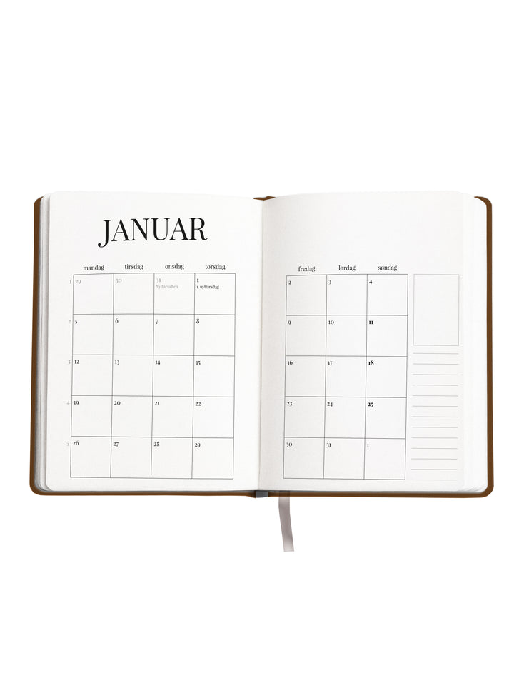 Åpen planlegger med månedsoversikt kalender