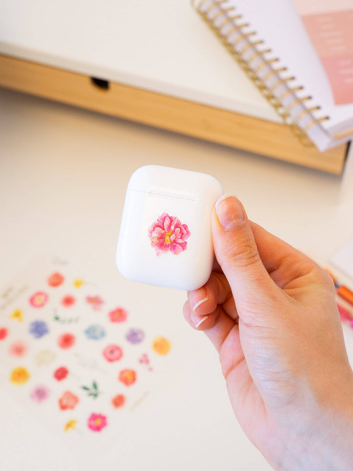 Dekorative klistremerker på earpods