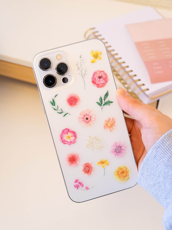 Klistremerker med blomster på mobilcover